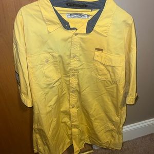 Yellow Akoo shirt
